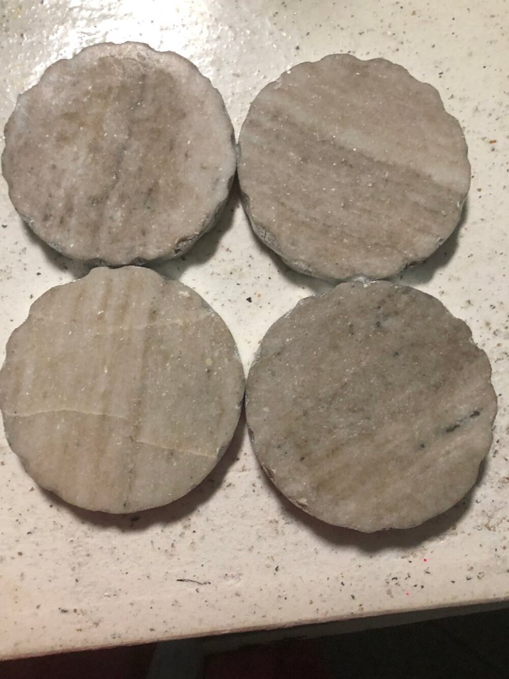 4 Marble coasters with silver trim